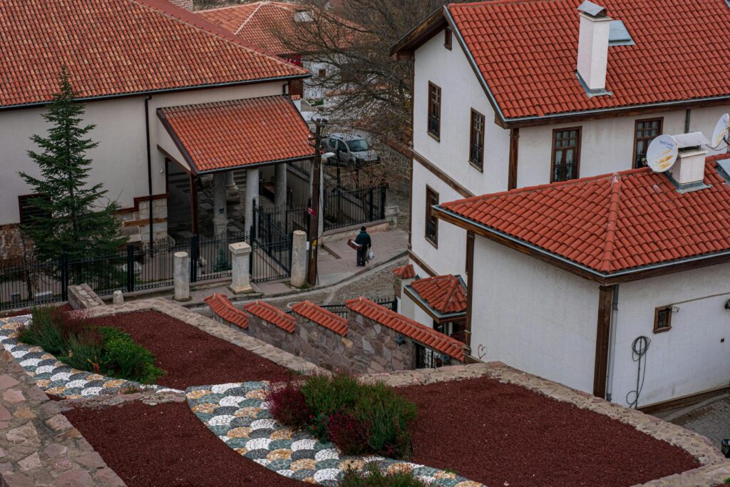 Explore traditional architecture with red-tiled roofs in Ankara, Türkiye.
