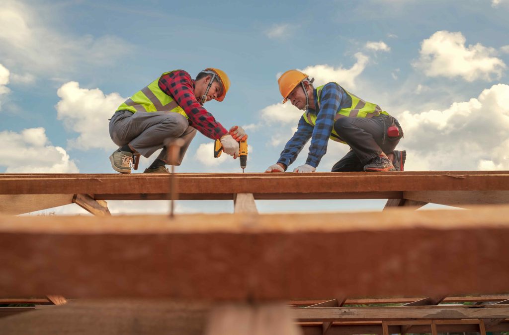 construction,expertise,male,roofer,carpenter,wear,safety,uniform,working,on